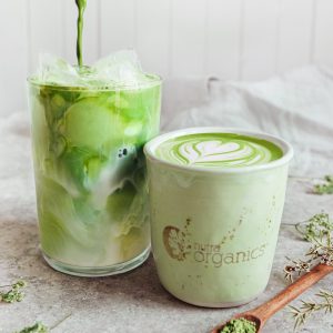 Nutra Organics Matcha Latte made in a green smoothie in a cup and class