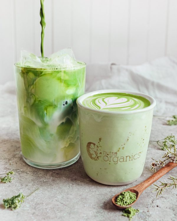 Nutra Organics Matcha Latte made in a green smoothie in a cup and class