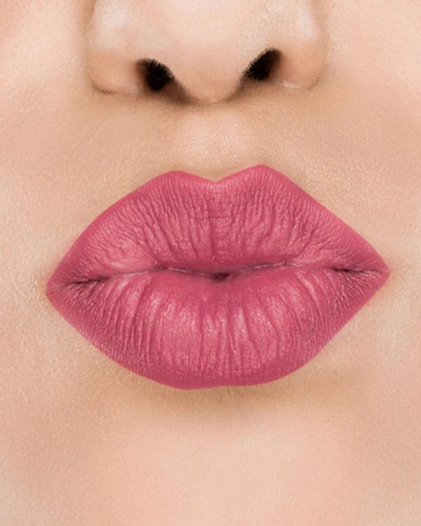 Raww - Coconut Kiss Lipstick in the shade of Cool Cherry with a closeup image applied to a woman's puckered lips