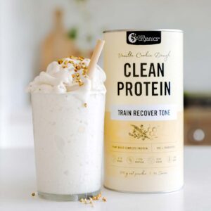 Nutra Organics Clean Protein Vanilla Cookie Dough Flavour Smoothie with product container on a kitchen table