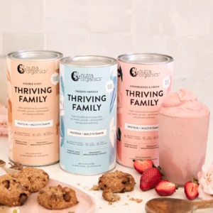 Display of all three flavours of Nutra Organic in 450 gram containers shown with thick delicious smoothie